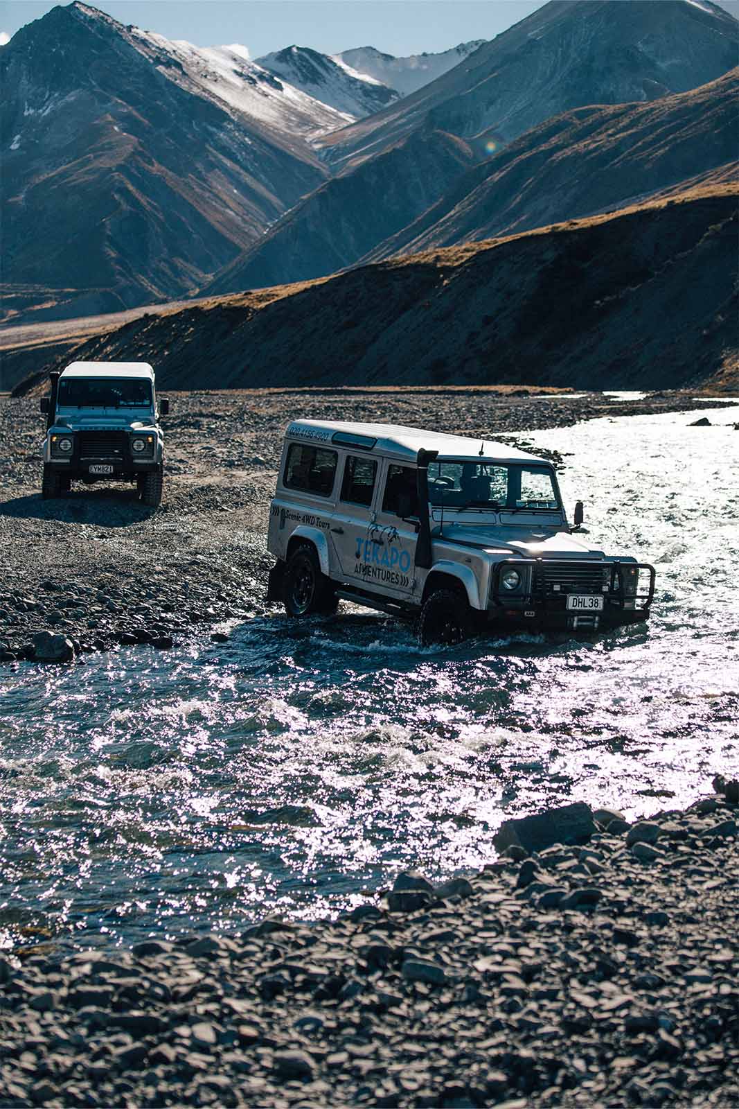 Tekapo Adventures Land Rover crossing river with another Land Rover following