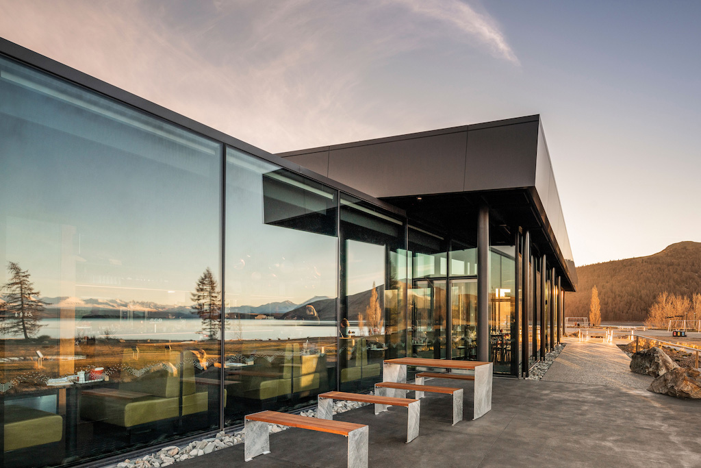 Dark Sky Diner from the outside, looking toward the building with warm sunlight reflections