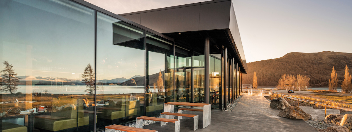 Dark Sky Diner from the outside, looking toward the building with warm sunlight reflections